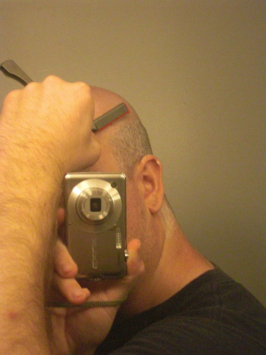 Picture showing me shaving side of head with shavette