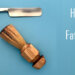Straight razor and shaving brush on a light blue background with the words "Happy Father's Day" in white.