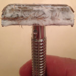 A MicroTouch One razor clogged with hair