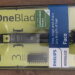 A picture of a Philips Norelco OneBlade "Face" razor still in the packaging.