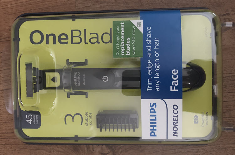A picture of a Philips Norelco OneBlade "Face" razor still in the packaging.